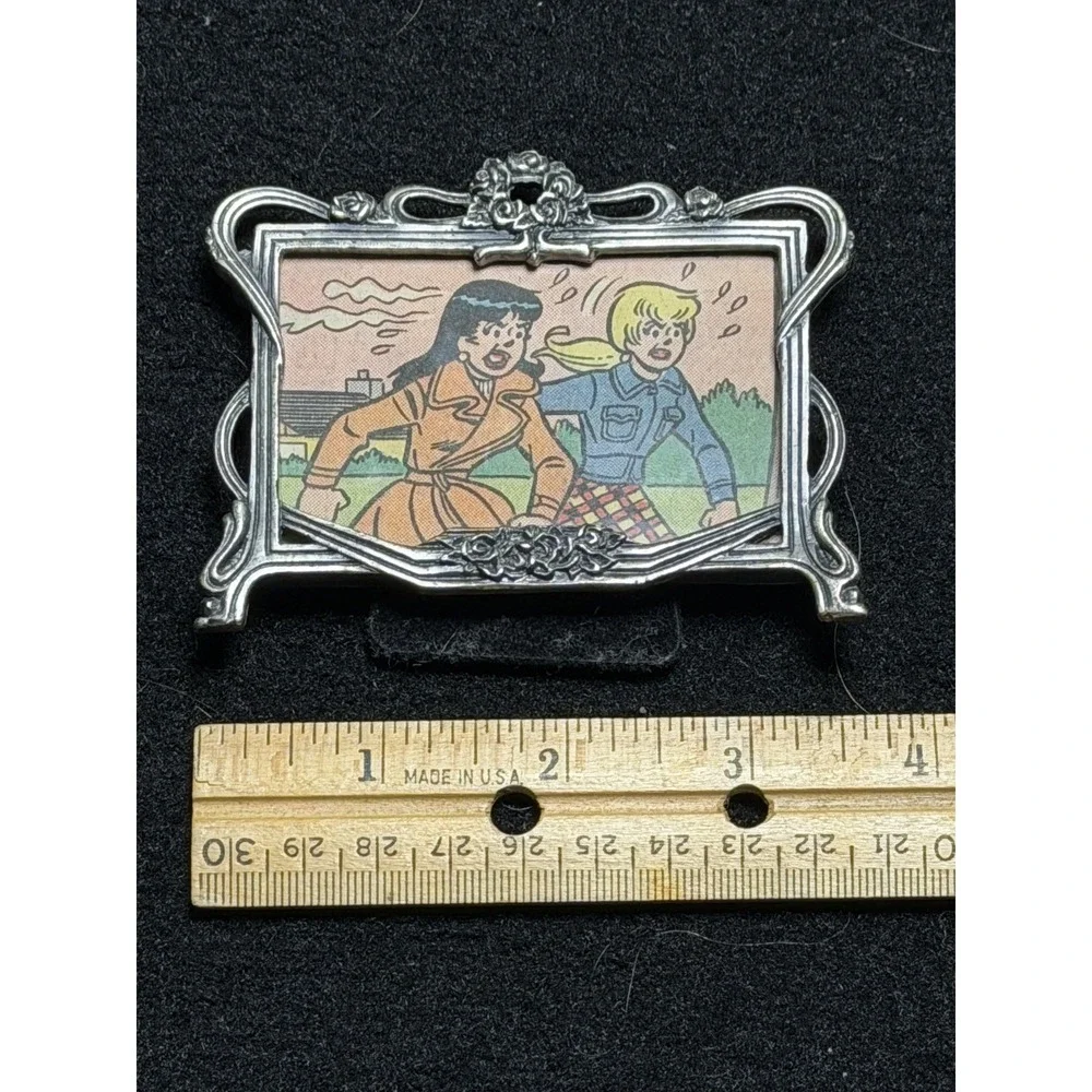 Vintage Betty & Veronica Archie comic in ordinate silver metal frame 2×3 easel